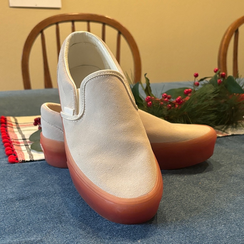 Vans Cream Slip-On Sneakers with Red Sole